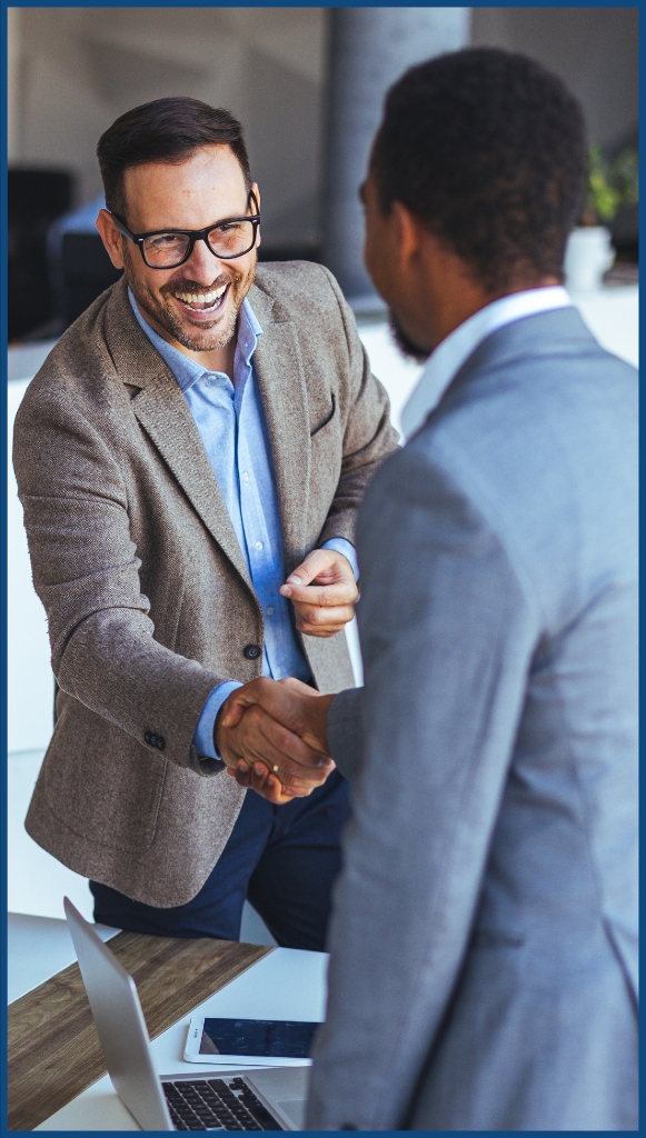 Two business men shaking hands